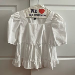 White puffed sleeve top